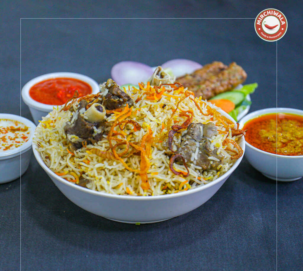 Aromatic long-grain basmati rice cooked with tender mutton and mild green spices, served with our signature spicy red chilli-garlic chutney.